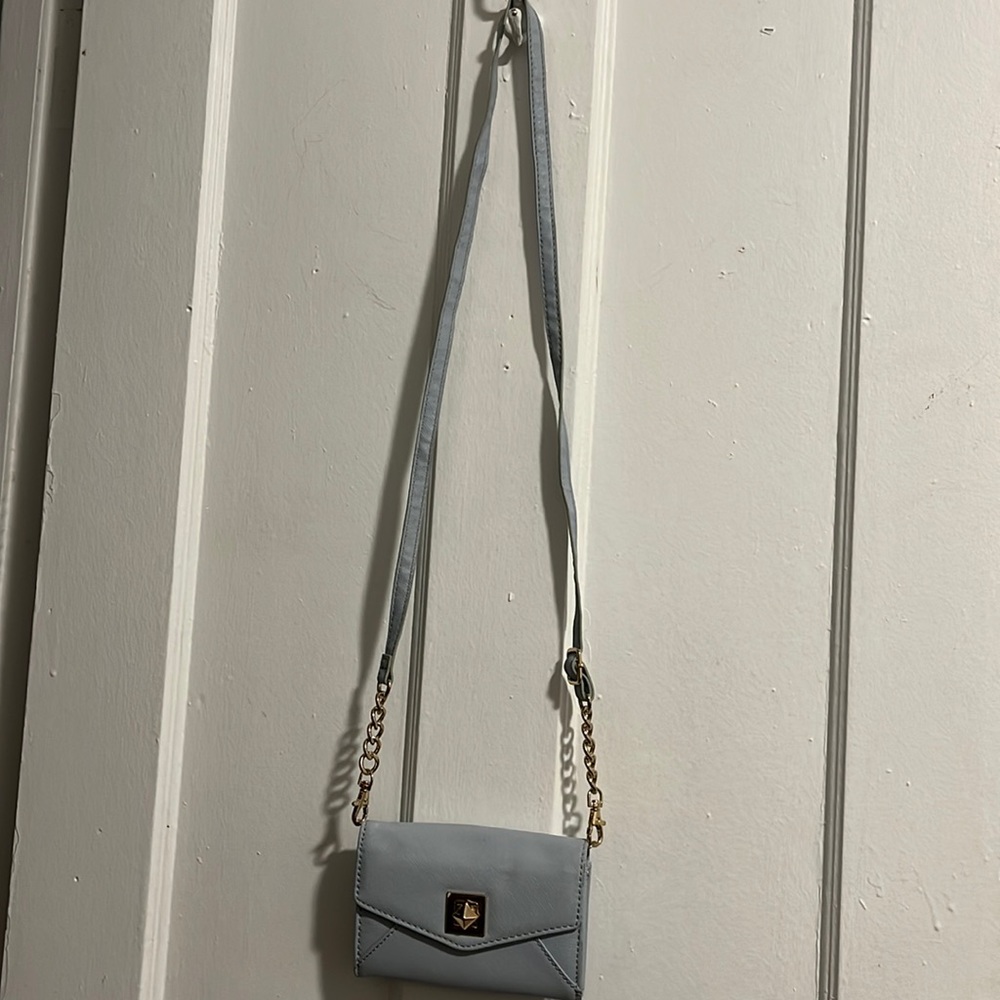 Baby blue clutch w cross body strap